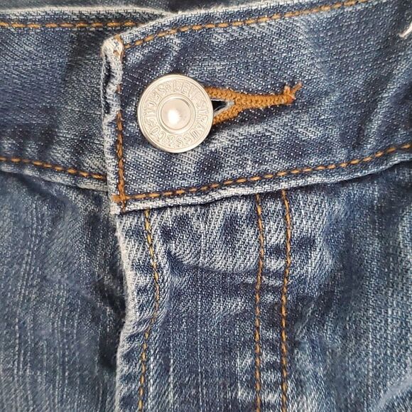 Levi's Cutoff Distressed Jean Shorts - Picture 3 of 12